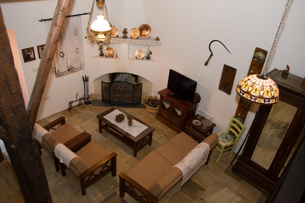 Xenios Cottages Lofou Quarto foto
